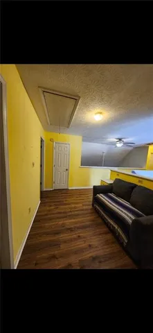 a view of outdoor space with wooden floor