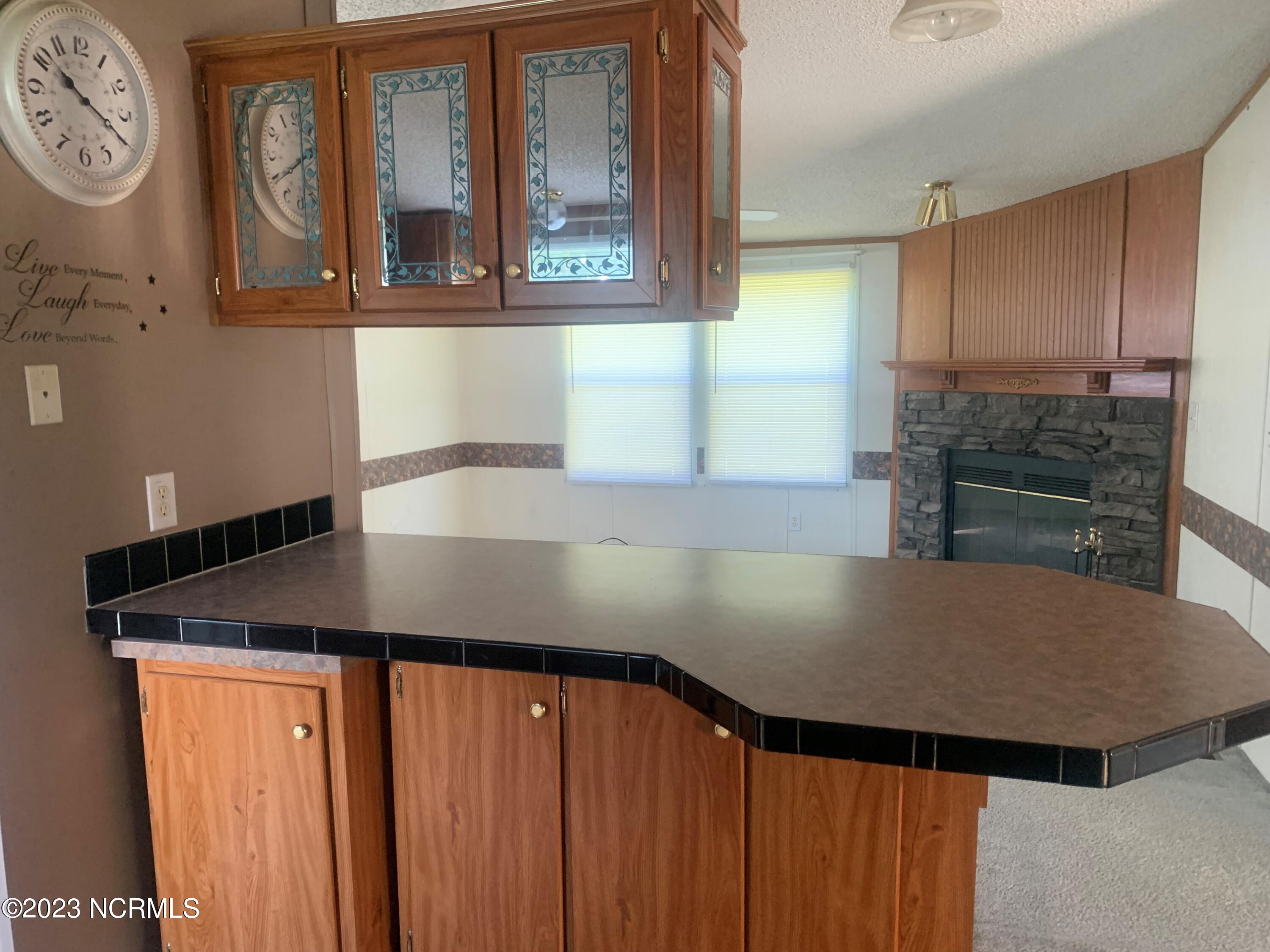 1333 Blue Creek Road, Unit 62 Jacksonville, NC 28540 - Photo 7 of 20 kitchen bar
