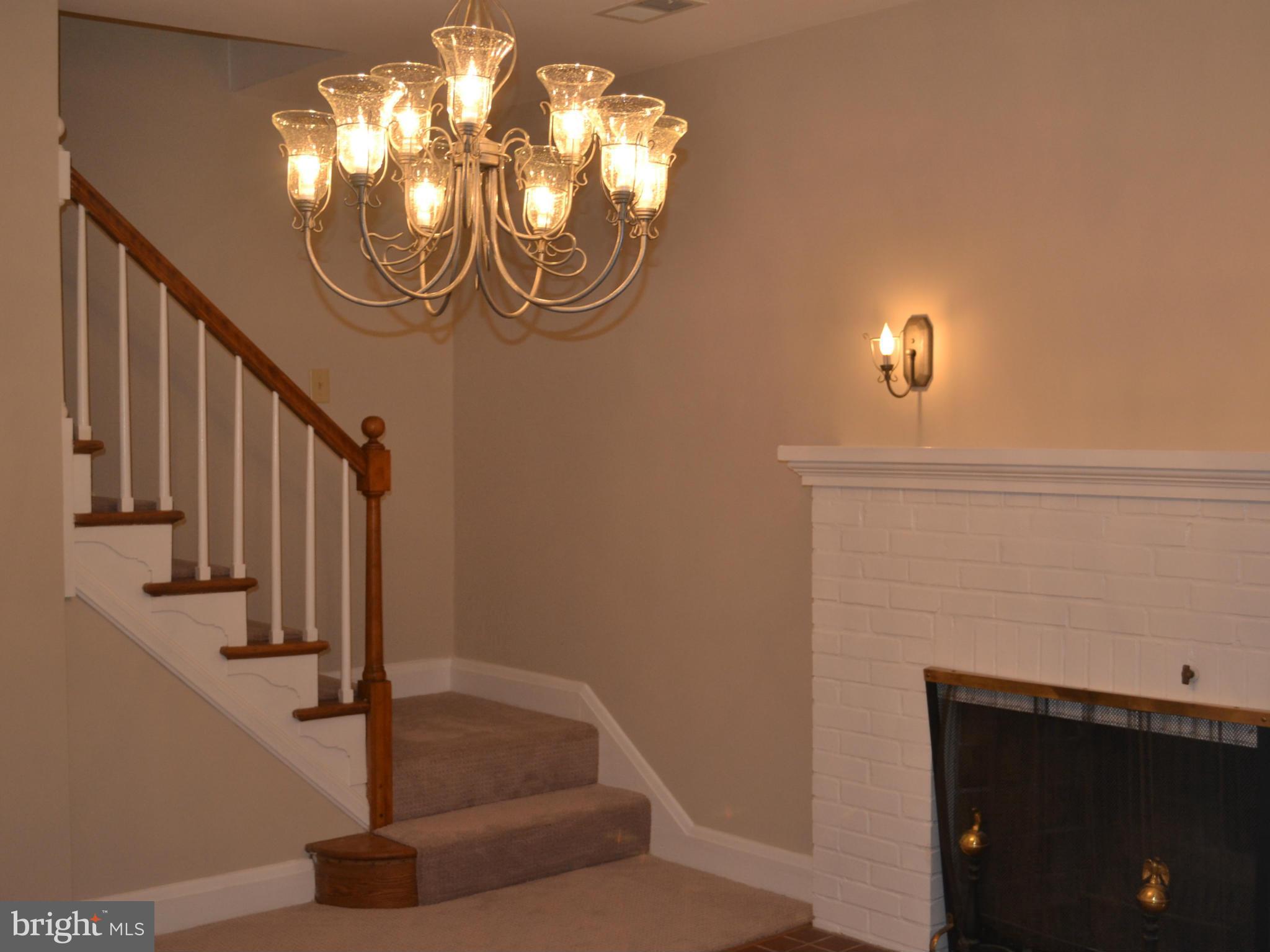 2829 Merrymans Mill Road Phoenix, MD 21131 - Photo 14 of 26 a view of entryway and hall with wooden floor