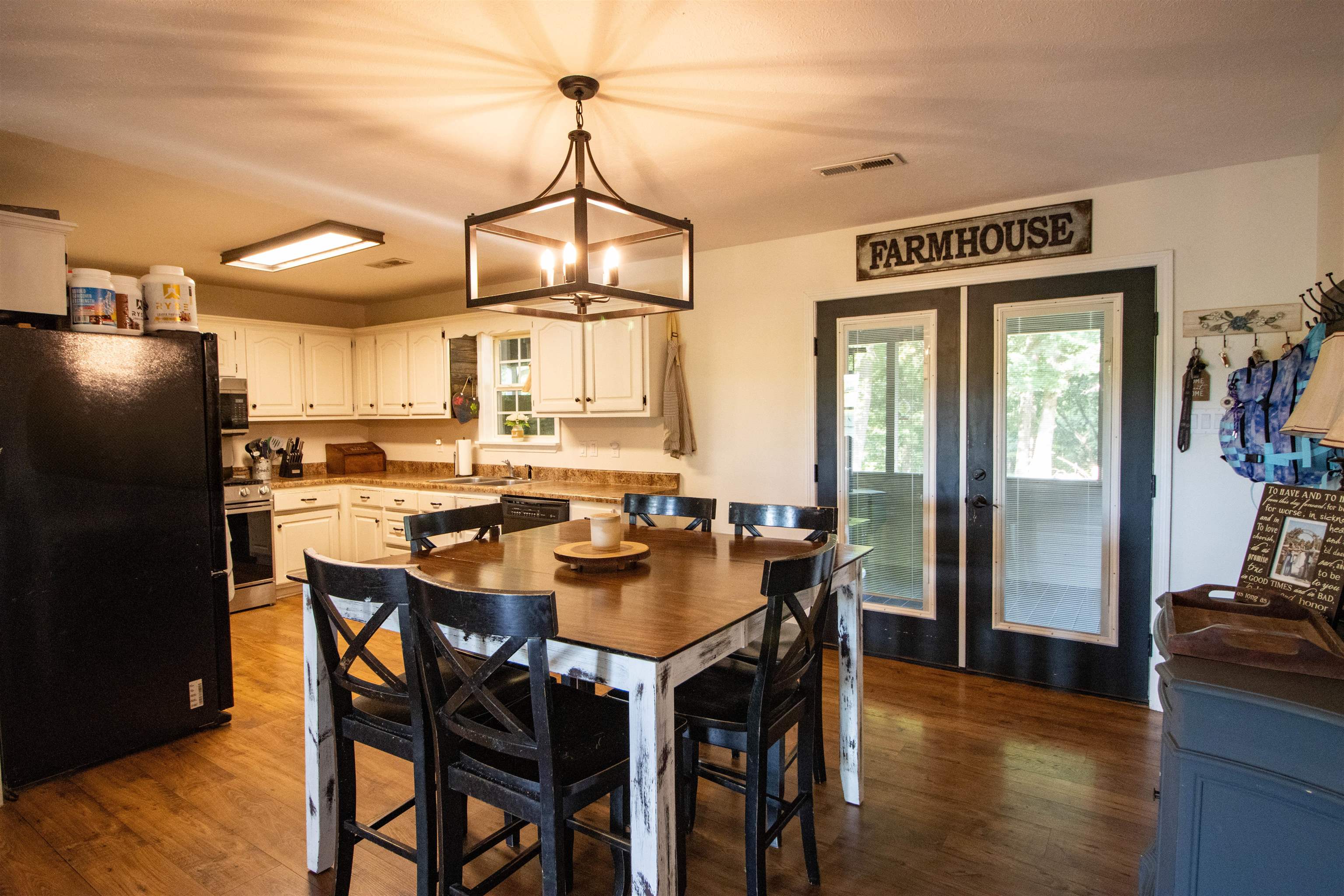120 Craig Road Ripley, TN 38063 - Photo 13 of 38 Kitchen featuring white cabinetry and wood-finish flooring
