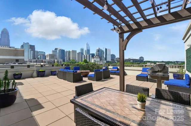 a view of a terrace with sitting area