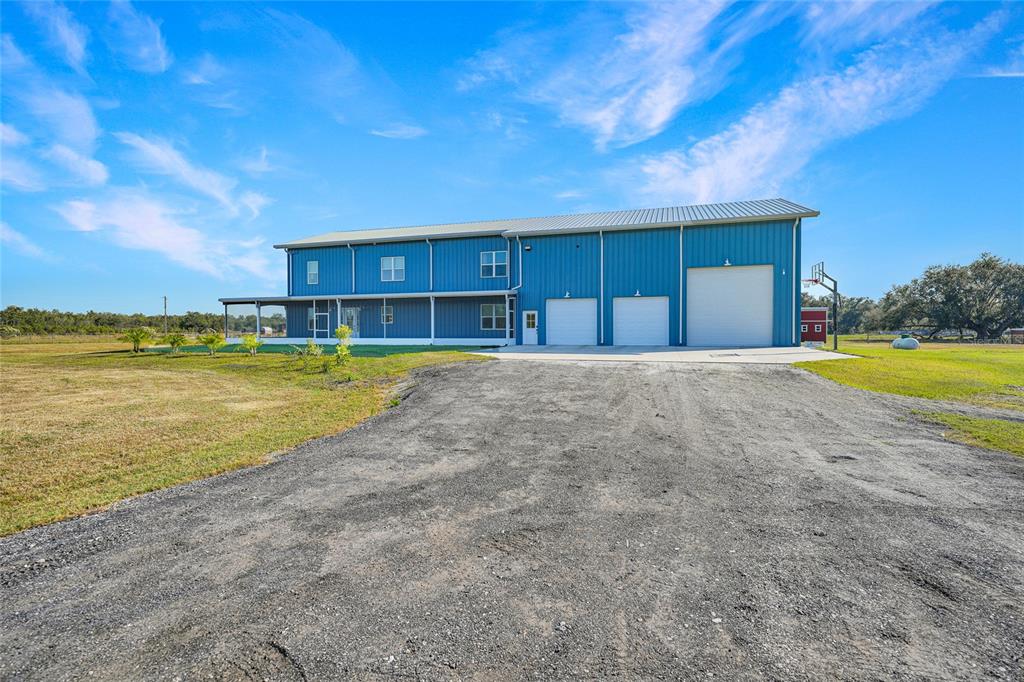 3321 Southwest Martin Lane Arcadia, FL 34266 - Photo 2 of 81 a view of a swimming pool with an outdoor seating
