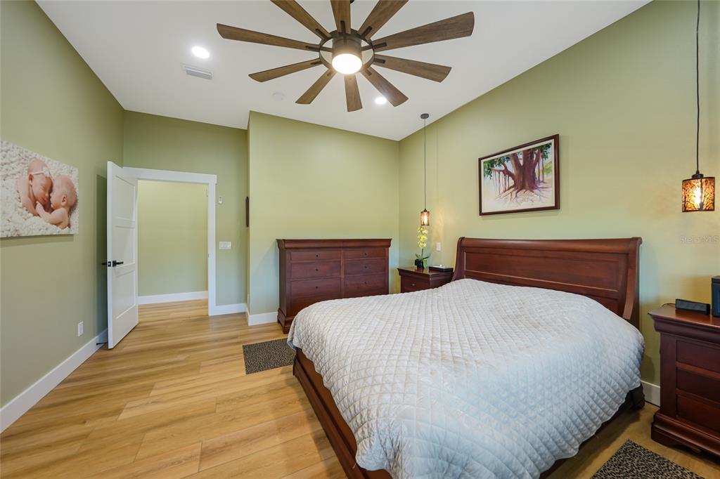 3321 Southwest Martin Lane Arcadia, FL 34266 - Photo 22 of 81 a bedroom with a bed and a painting on the wall