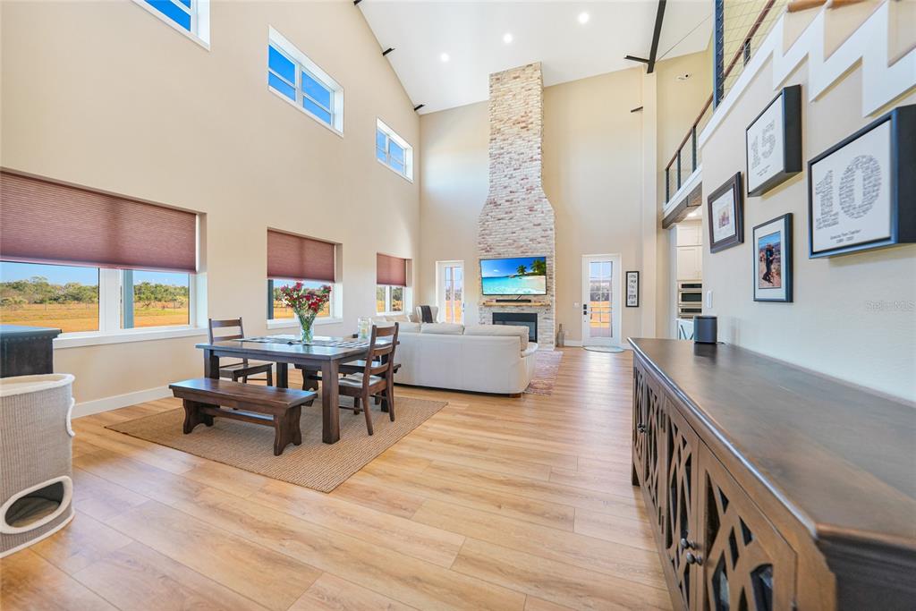 3321 Southwest Martin Lane Arcadia, FL 34266 - Photo 3 of 81 a living room with furniture and a wooden floor