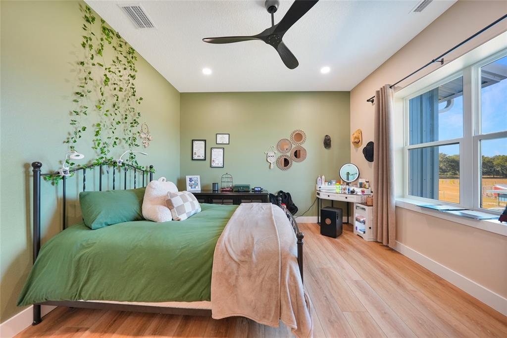3321 Southwest Martin Lane Arcadia, FL 34266 - Photo 41 of 81 a living room with furniture and a large window