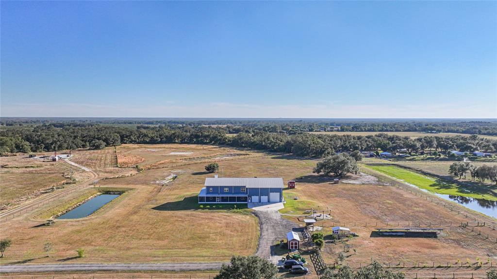 3321 Southwest Martin Lane Arcadia, FL 34266 - Photo 67 of 81 an aerial view of residential houses with outdoor space