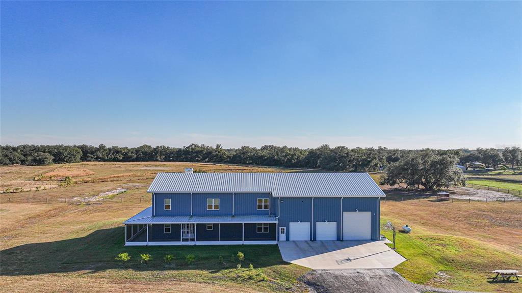3321 Southwest Martin Lane Arcadia, FL 34266 - Photo 79 of 81 a view of a terrace with a lake view