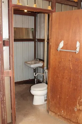 a bathroom with a sink and a toilet