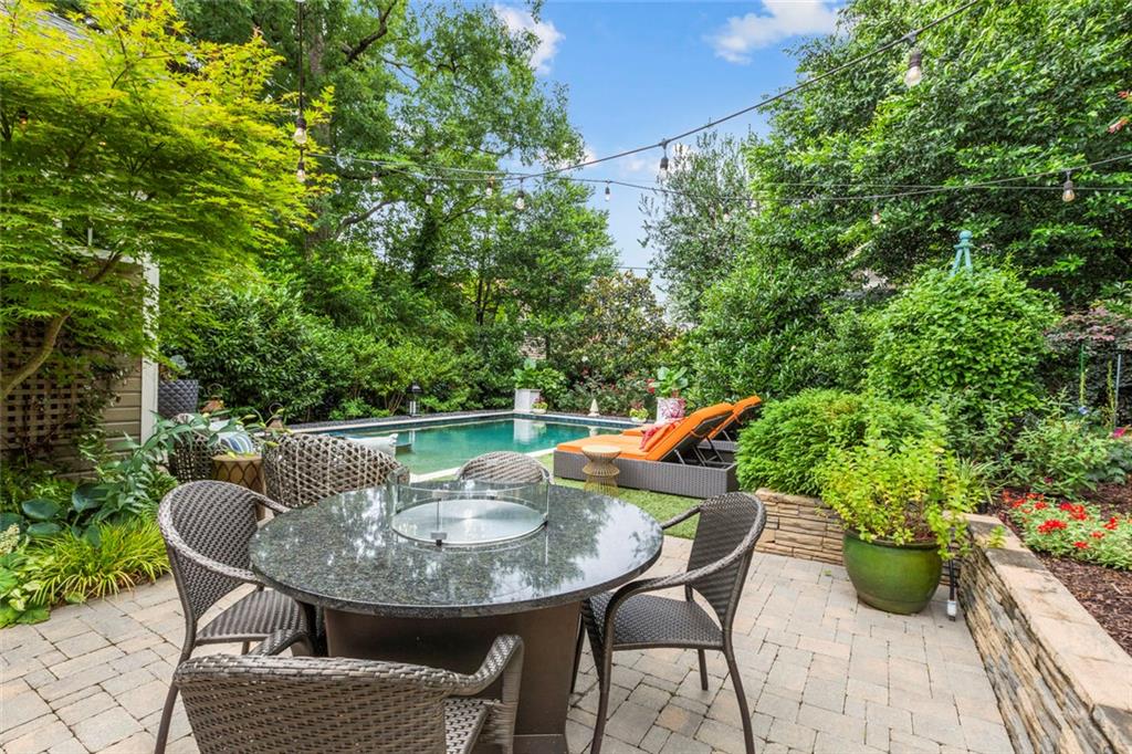 976 Adair Avenue Northeast Atlanta, GA 30306 - Photo 33 of 38 a balcony with table and chairs