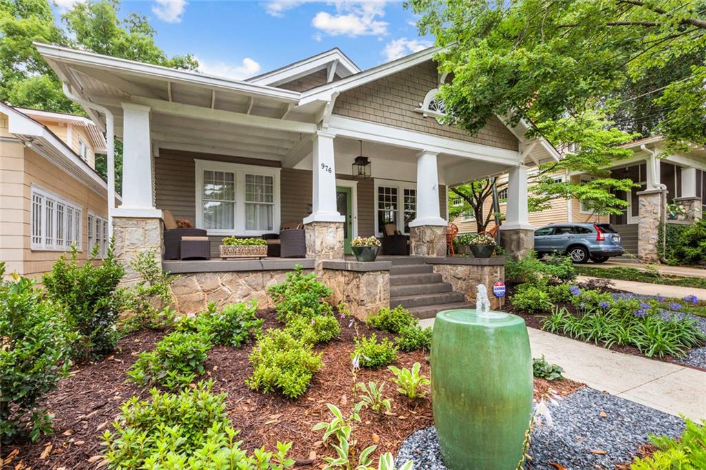 976 Adair Avenue Northeast Atlanta, GA 30306 - Photo 5 of 38 a front view of a house with a garden