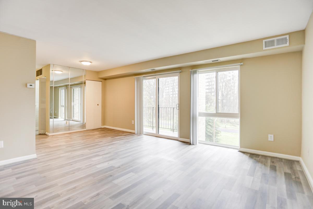 6139 Edsall Road, Unit I Alexandria, VA 22304 - Photo 5 of 26 Newer floor to ceiling windows