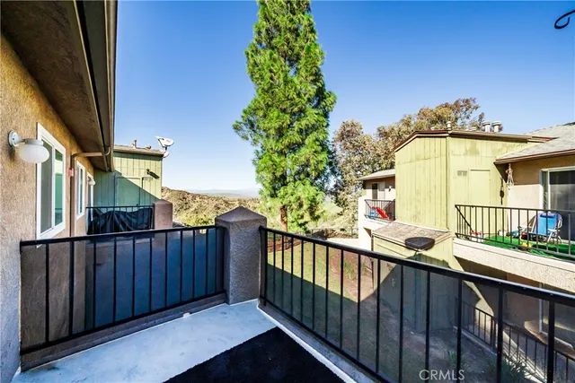 a view of a balcony with an outdoor space