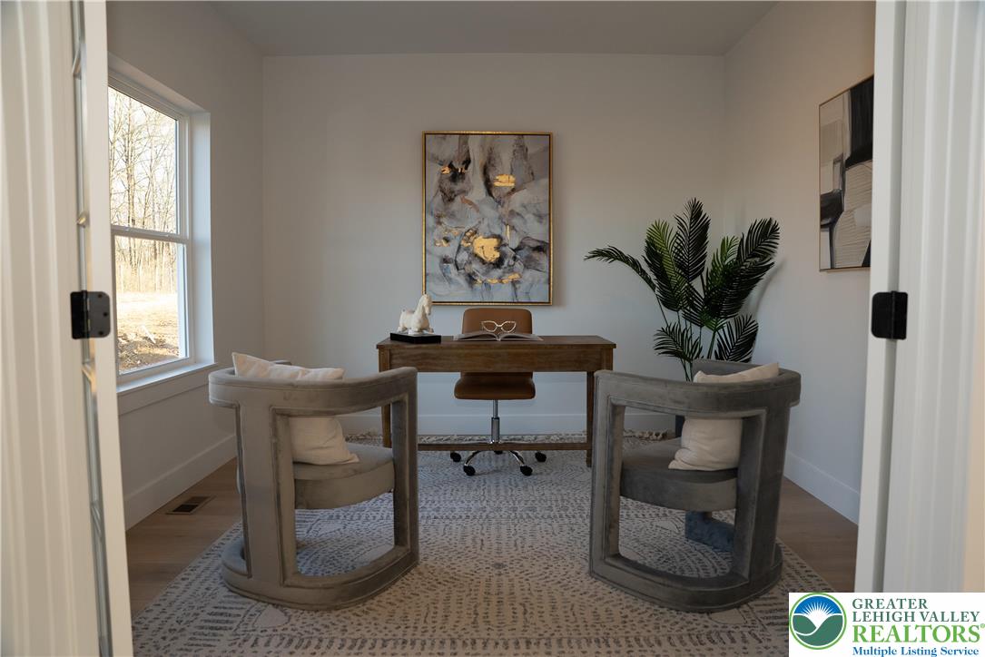3102 Moyer Road Hellertown, PA 18055 - Photo 11 of 35 a view of a workspace with furniture and a window