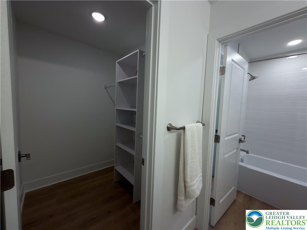 3102 Moyer Road Hellertown, PA 18055 - Photo 22 of 35 a view of room with walk in closet and wooden floor