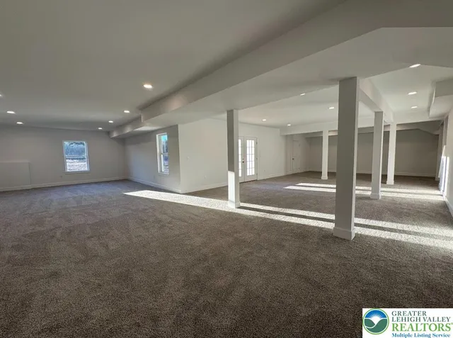 a view of gallery with wooden floor