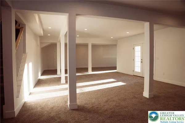 an empty room with windows
