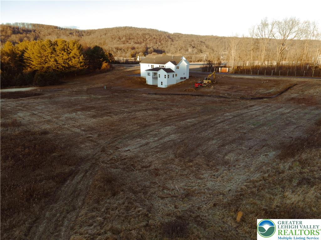 3102 Moyer Road Hellertown, PA 18055 - Photo 34 of 35 a view of a town with mountains in the background