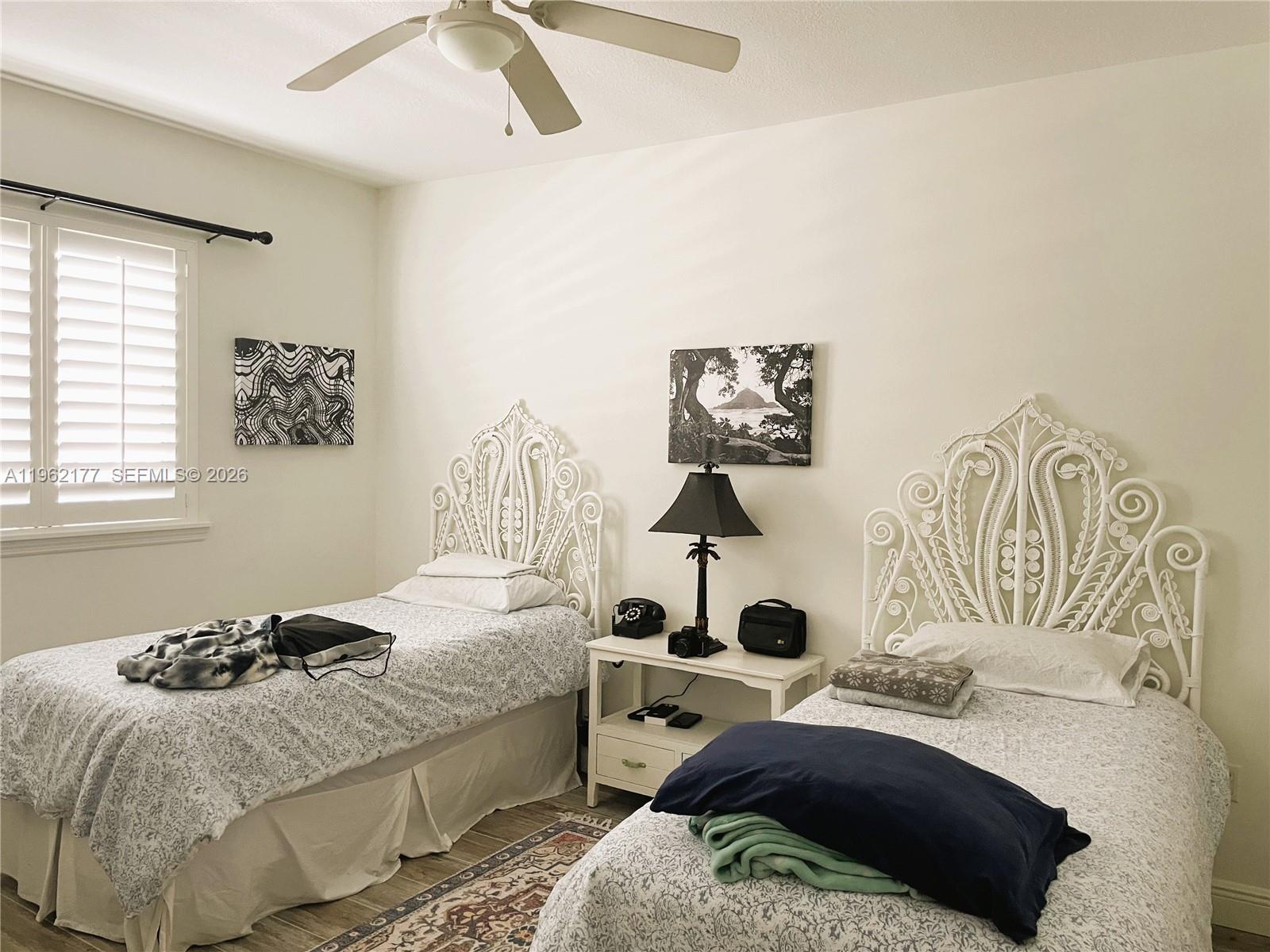 29 Bass Avenue Key Largo, FL 33037 - Photo 34 of 38 a bedroom with a bed and a window