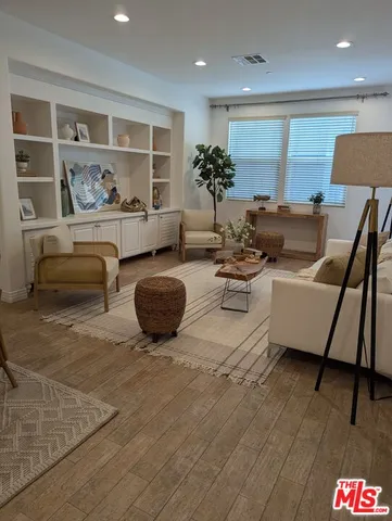 a living room with furniture and a couch