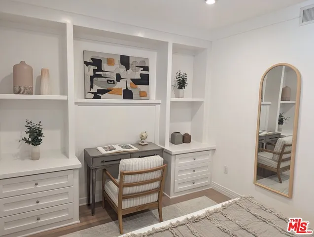 a view of room with cabinets