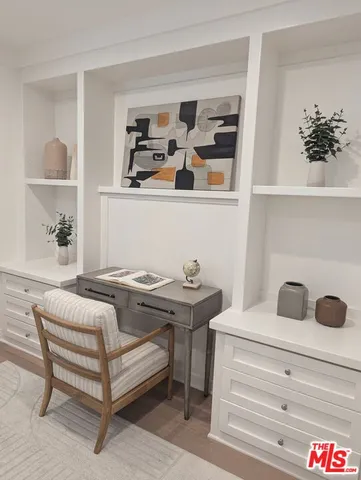 a living room with furniture and decor