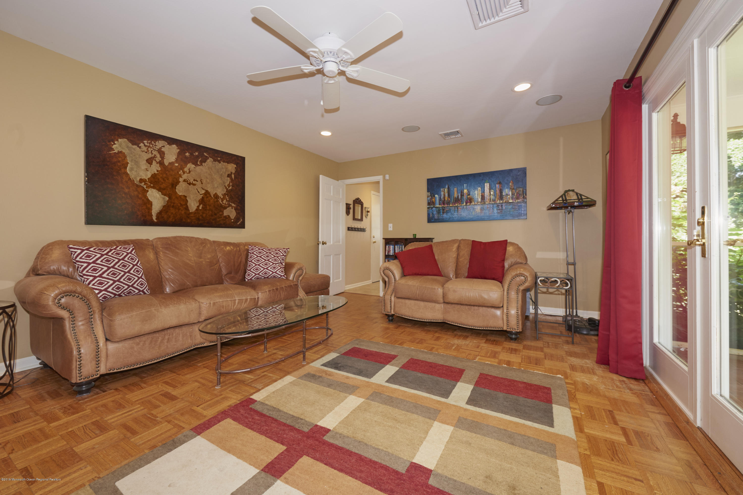 90 Dwight Road Middletown, NJ 07748 - Photo 7 of 19 Family room opens to sunroom