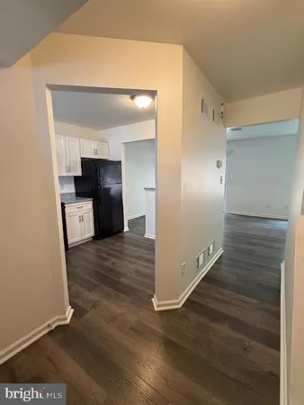 wooden floor and an empty room with wooden floor