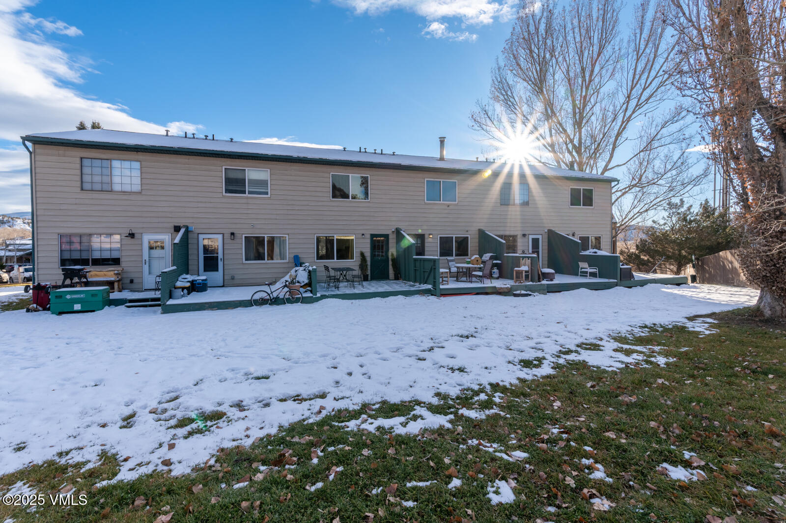85 Chambers Avenue, Unit 10 Eagle, CO 81631 - Photo 18 of 37 a view of a house with a yard