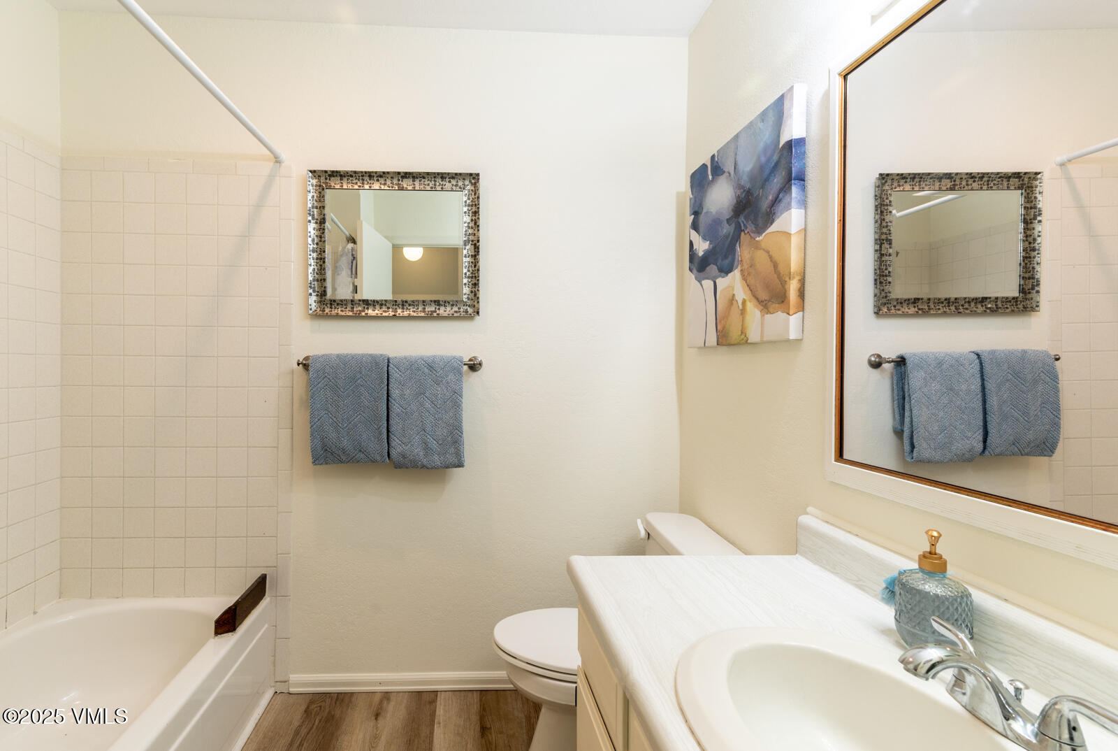 85 Chambers Avenue, Unit 10 Eagle, CO 81631 - Photo 23 of 37 a bathroom with a sink and a mirror
