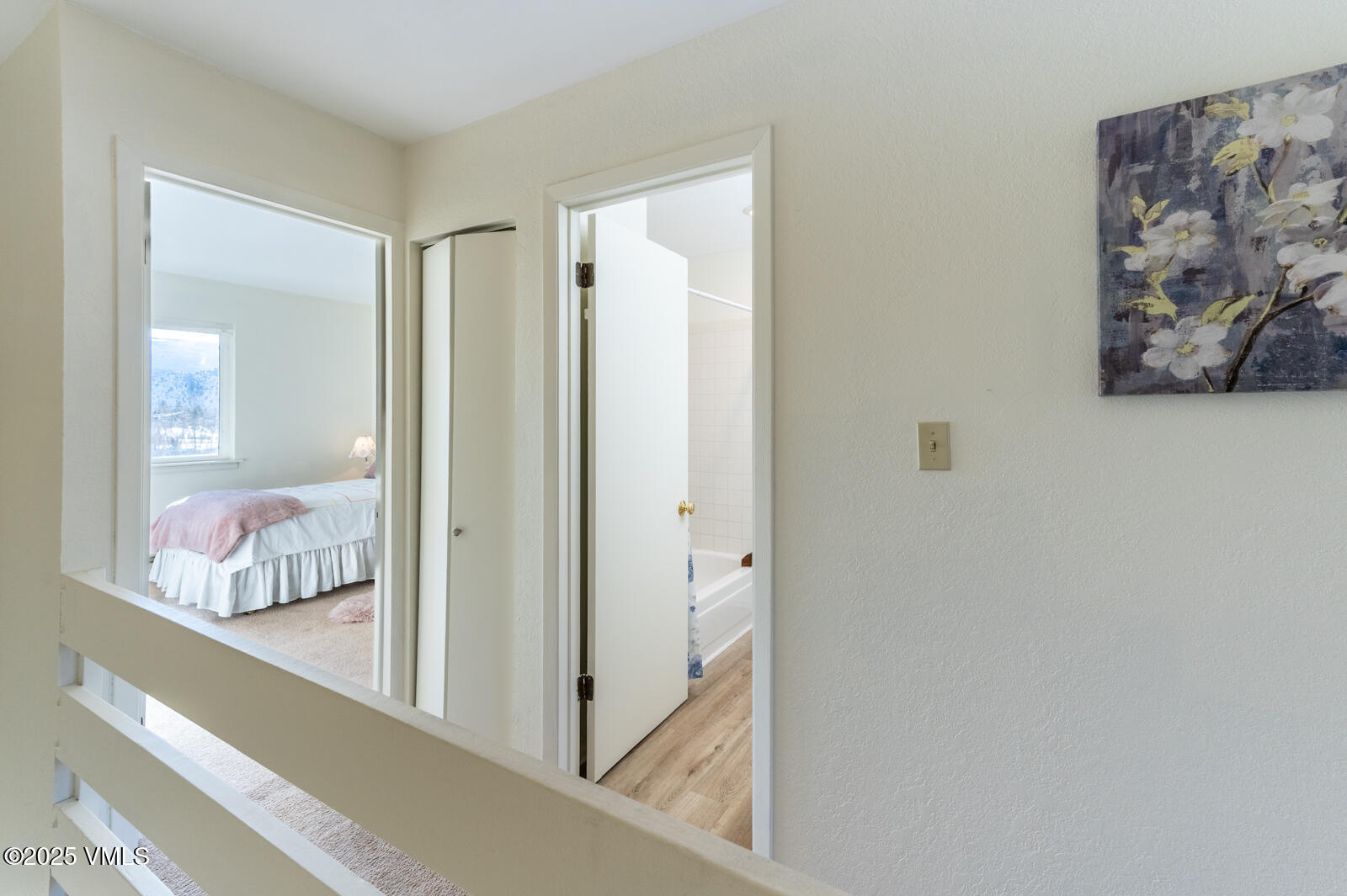 85 Chambers Avenue, Unit 10 Eagle, CO 81631 - Photo 28 of 37 a view of a bathroom from a hallway