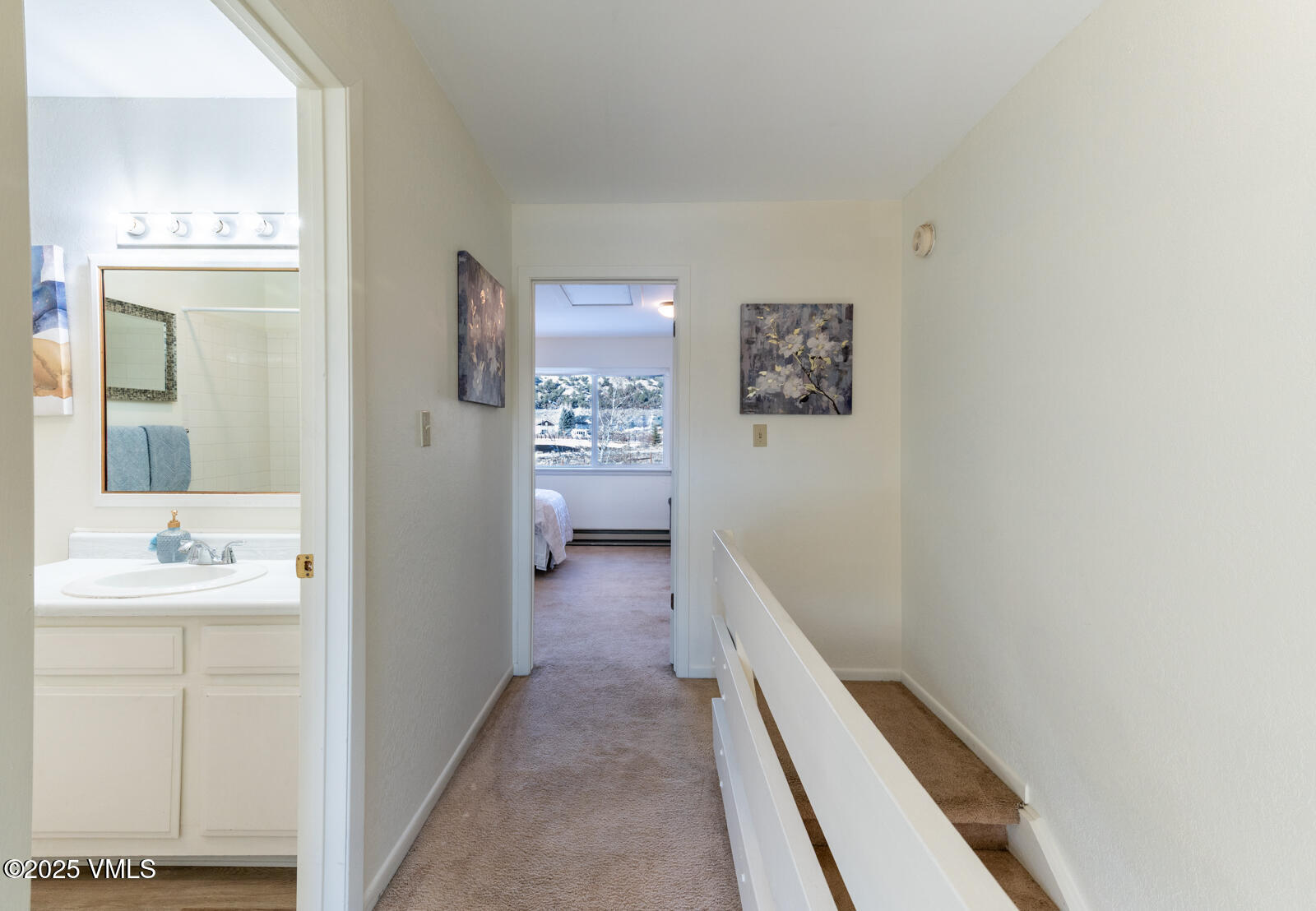 85 Chambers Avenue, Unit 10 Eagle, CO 81631 - Photo 29 of 37 a bathroom with a sink and a mirror