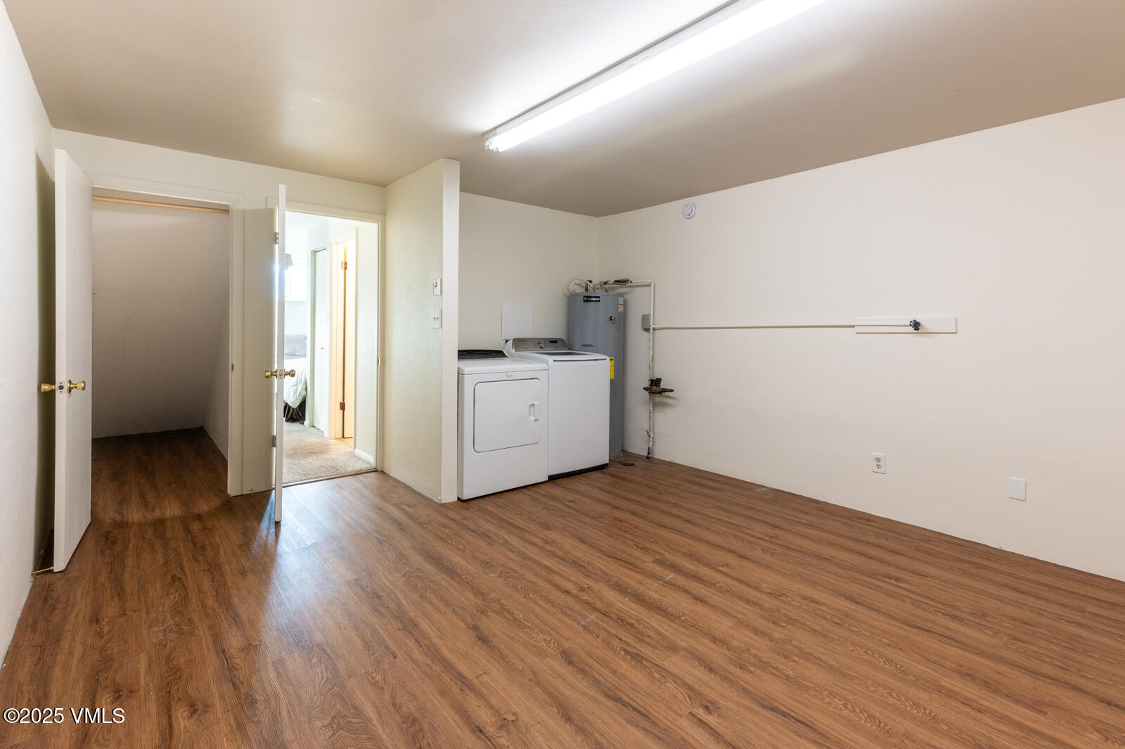 85 Chambers Avenue, Unit 10 Eagle, CO 81631 - Photo 35 of 37 a view of a kitchen with wooden floor