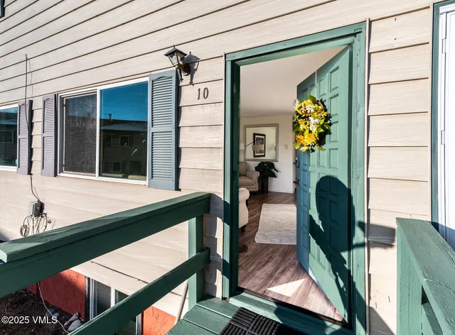 a front view of a house with an ocean view