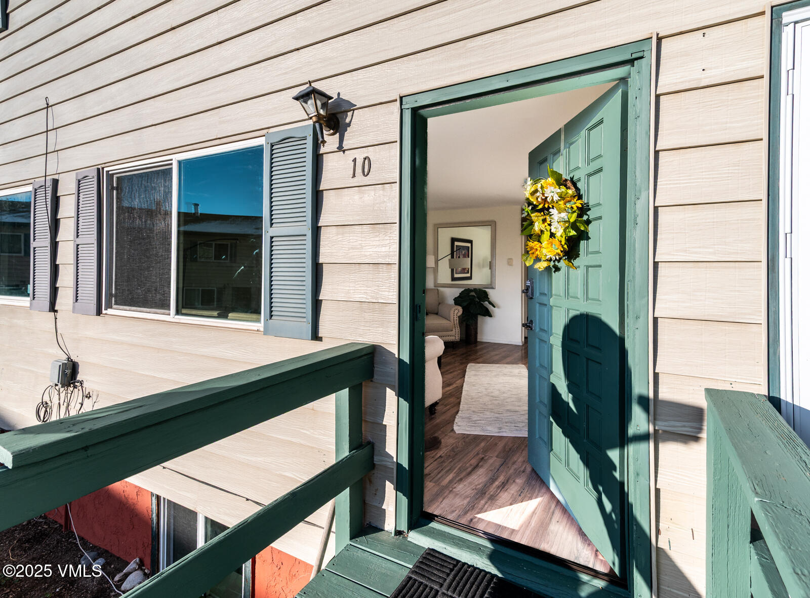 85 Chambers Avenue, Unit 10 Eagle, CO 81631 - Photo 36 of 37 a balcony with table and chairs