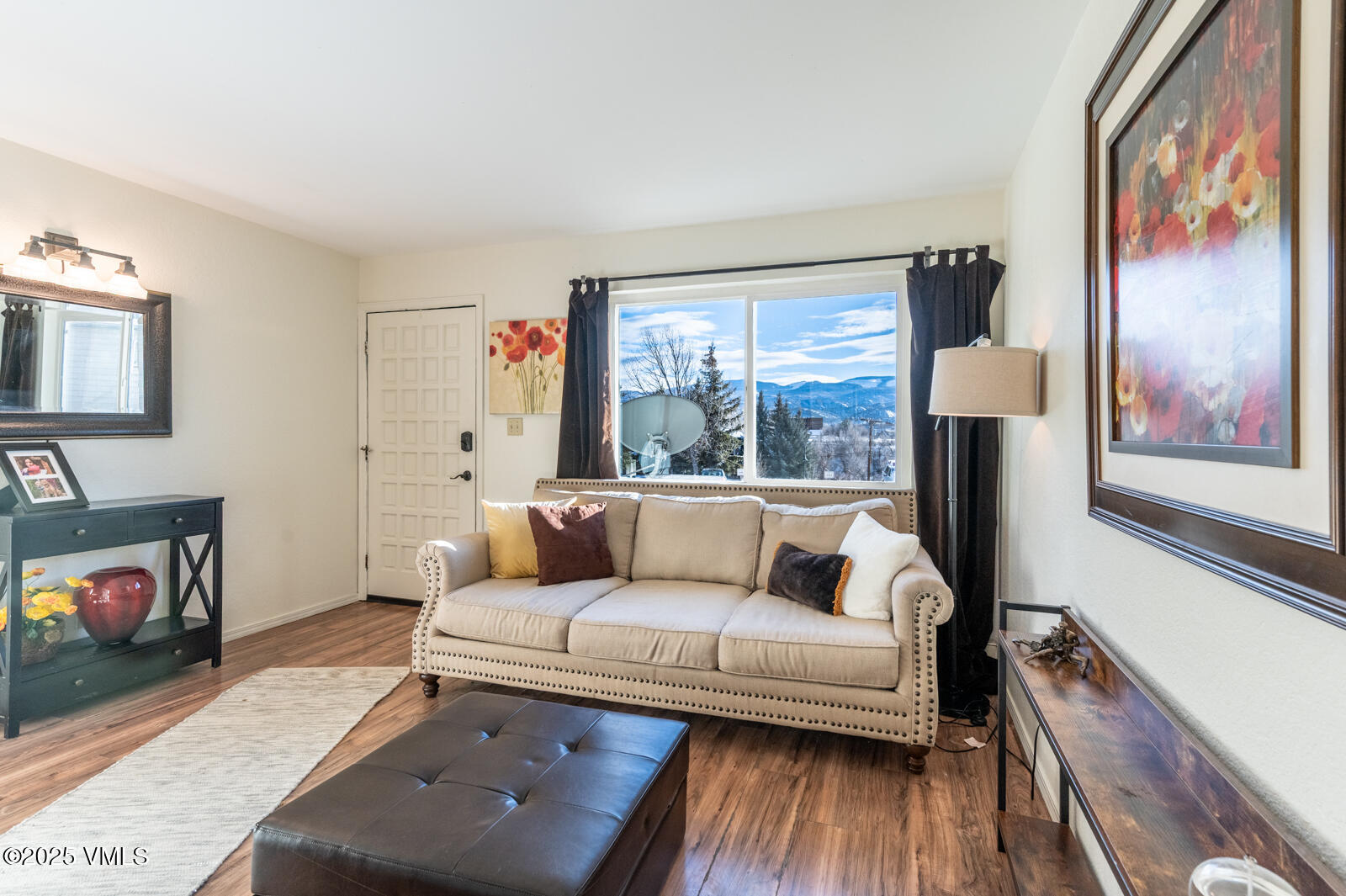 85 Chambers Avenue, Unit 10 Eagle, CO 81631 - Photo 6 of 37 a living room with furniture and a fireplace