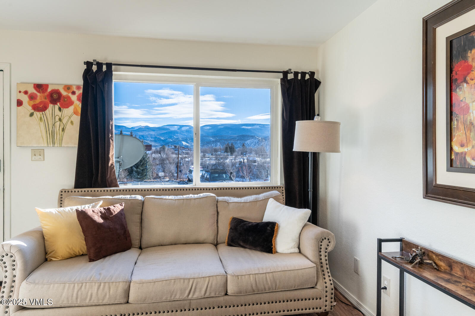 85 Chambers Avenue, Unit 10 Eagle, CO 81631 - Photo 7 of 37 a living room with furniture and a large window