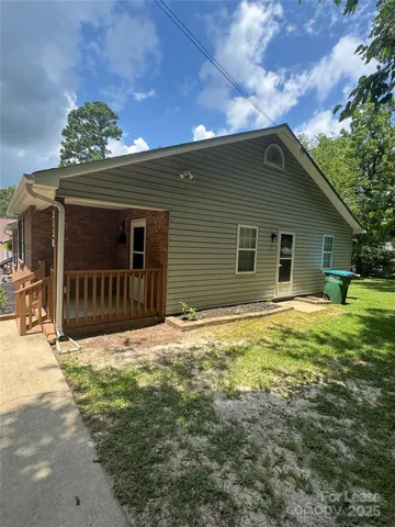 a house with yard in front of it