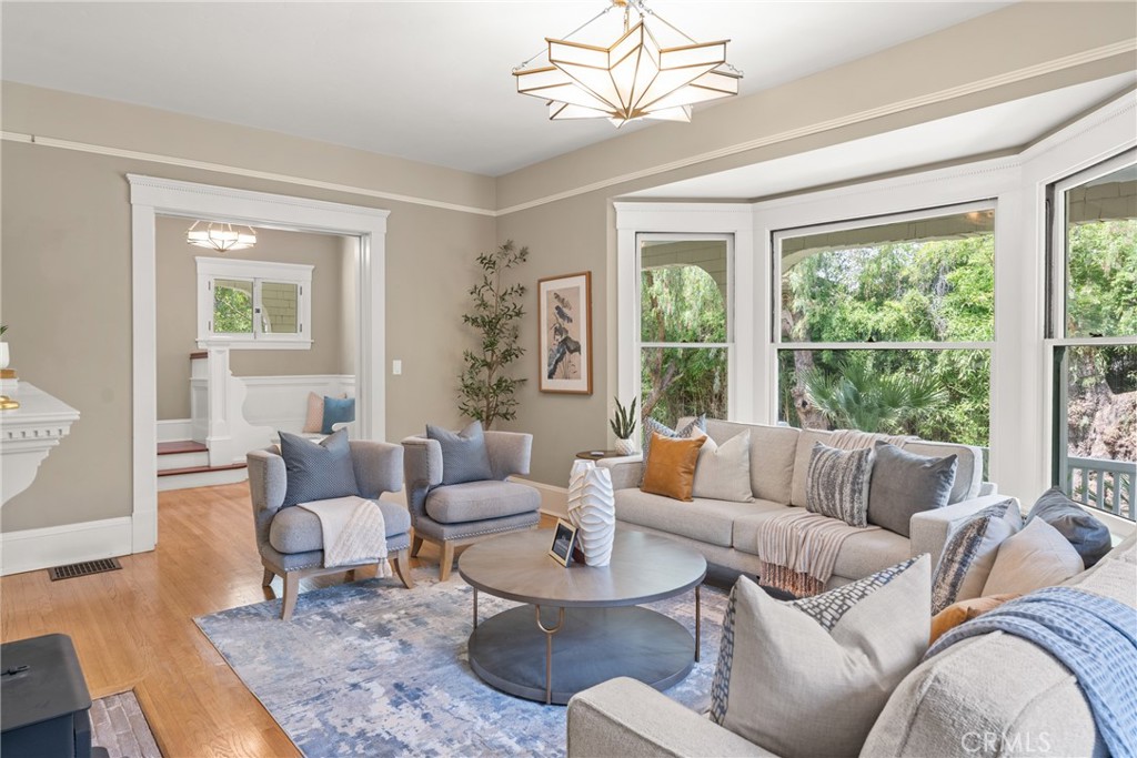16 Campbell Avenue Redlands, CA 92373 - Photo 11 of 57 a living room with furniture and a large window