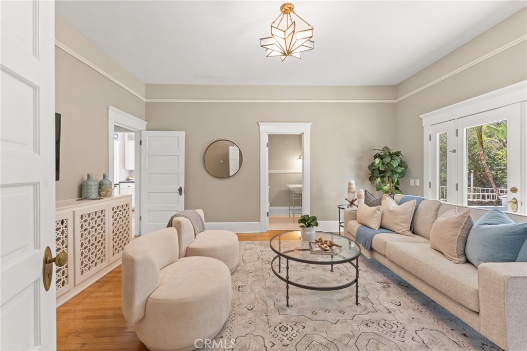 16 Campbell Avenue Redlands, CA 92373 - Photo 17 of 57 a living room with furniture chandelier and a table