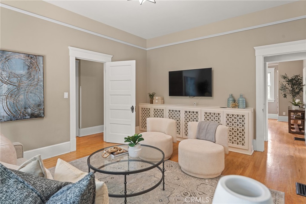 16 Campbell Avenue Redlands, CA 92373 - Photo 19 of 57 a living room with furniture and a flat screen tv