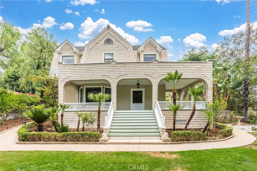 16 Campbell Avenue Redlands, CA 92373 - Photo 2 of 57 a front view of a house with garden
