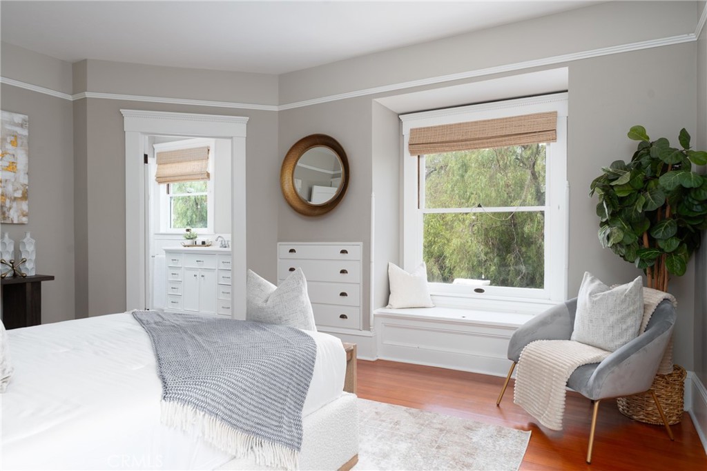 16 Campbell Avenue Redlands, CA 92373 - Photo 34 of 57 a bedroom with a bed and a large window