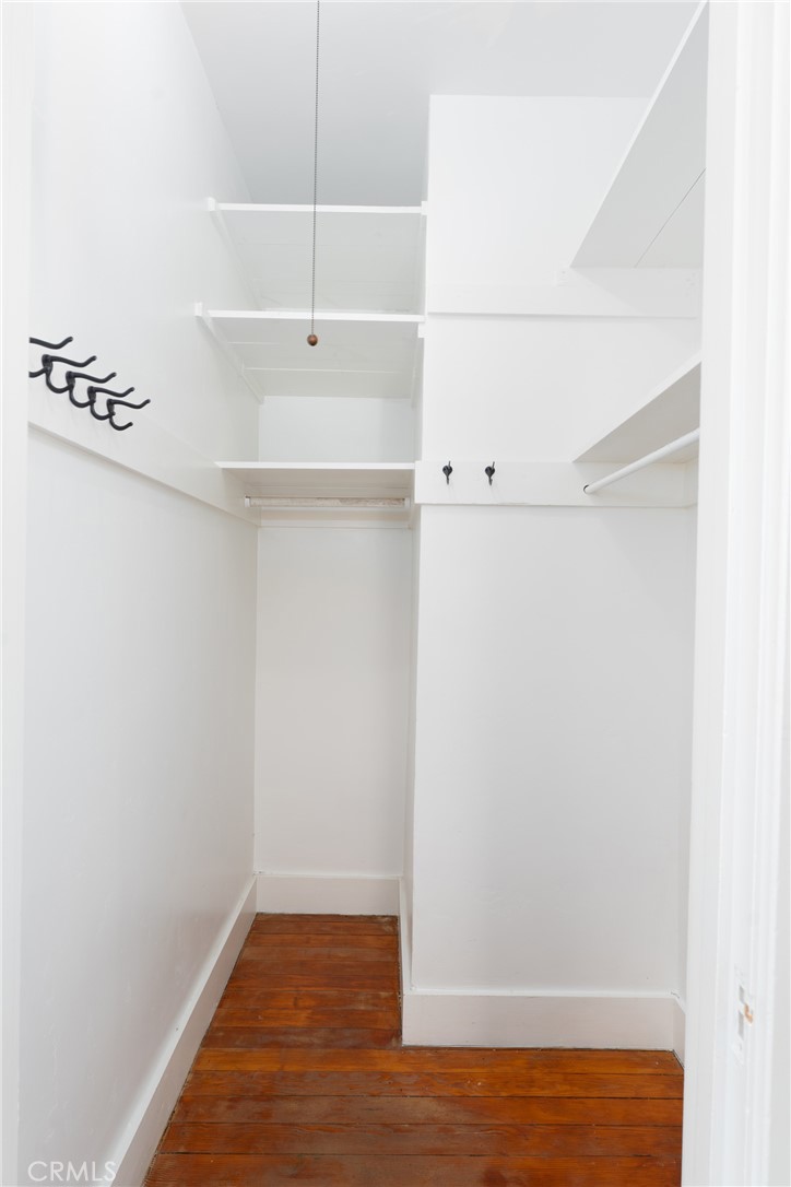 16 Campbell Avenue Redlands, CA 92373 - Photo 35 of 57 a view of walk in closet with clothes