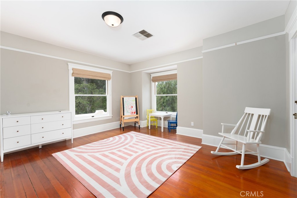 16 Campbell Avenue Redlands, CA 92373 - Photo 38 of 57 a bedroom with a bed and a window