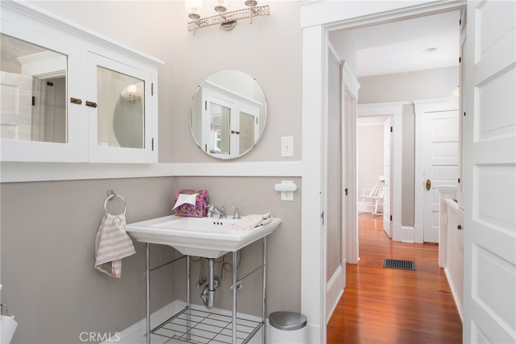 16 Campbell Avenue Redlands, CA 92373 - Photo 45 of 57 a en suite bathroom with a sink and a mirror