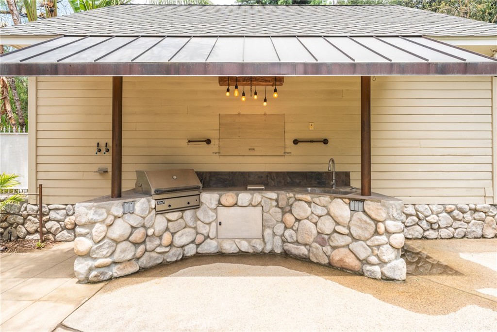 16 Campbell Avenue Redlands, CA 92373 - Photo 50 of 57 a front view of a house with a garage