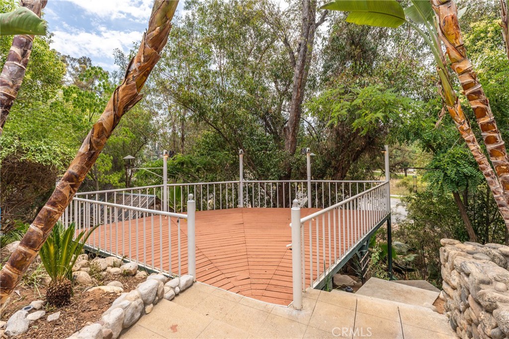16 Campbell Avenue Redlands, CA 92373 - Photo 52 of 57 a view of balcony with wooden floor and fence