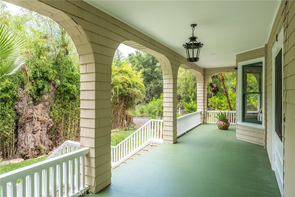 16 Campbell Avenue Redlands, CA 92373 - Photo 6 of 57 a view of a porch and garden