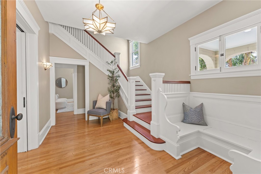 16 Campbell Avenue Redlands, CA 92373 - Photo 7 of 57 a living room with wooden floor and furniture