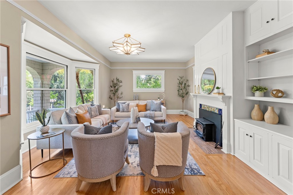 16 Campbell Avenue Redlands, CA 92373 - Photo 10 of 57 a living room with fireplace furniture and a large window